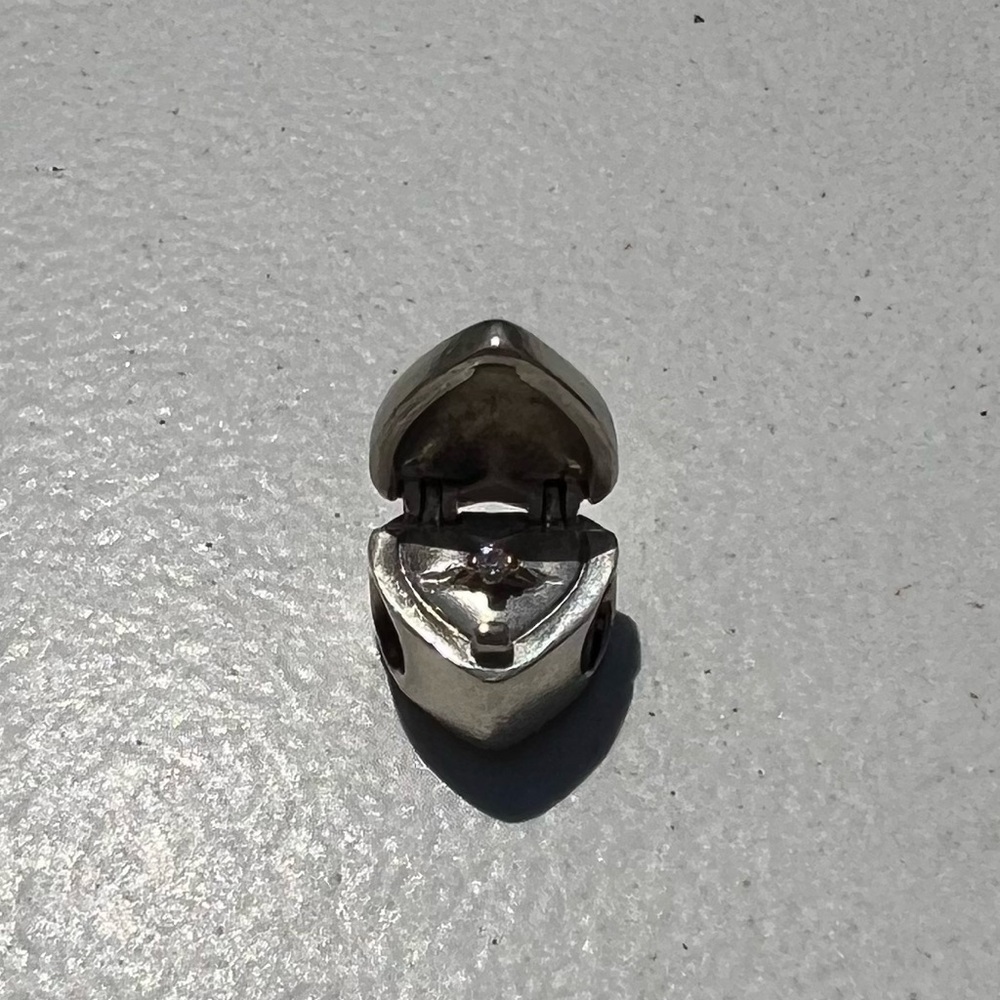 Retired Pandora “Gift from the heart” charm